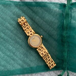 Gently Loved Women’s Raymond Weil 18k Gold electroplated watch w/diamonds.